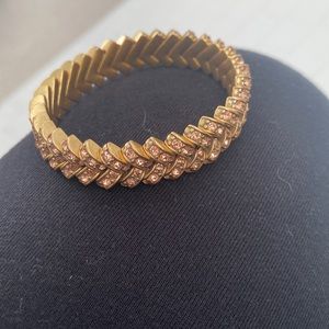 Gold stretch bracelet with amber stones.